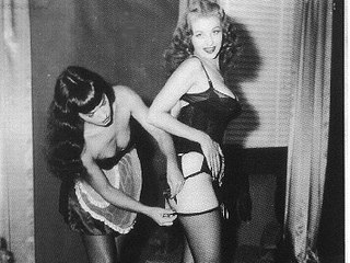 Retro Vintage Porn : honeys try stockings on and play with each other!
